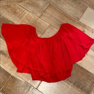 Backstage orange off the shoulder top